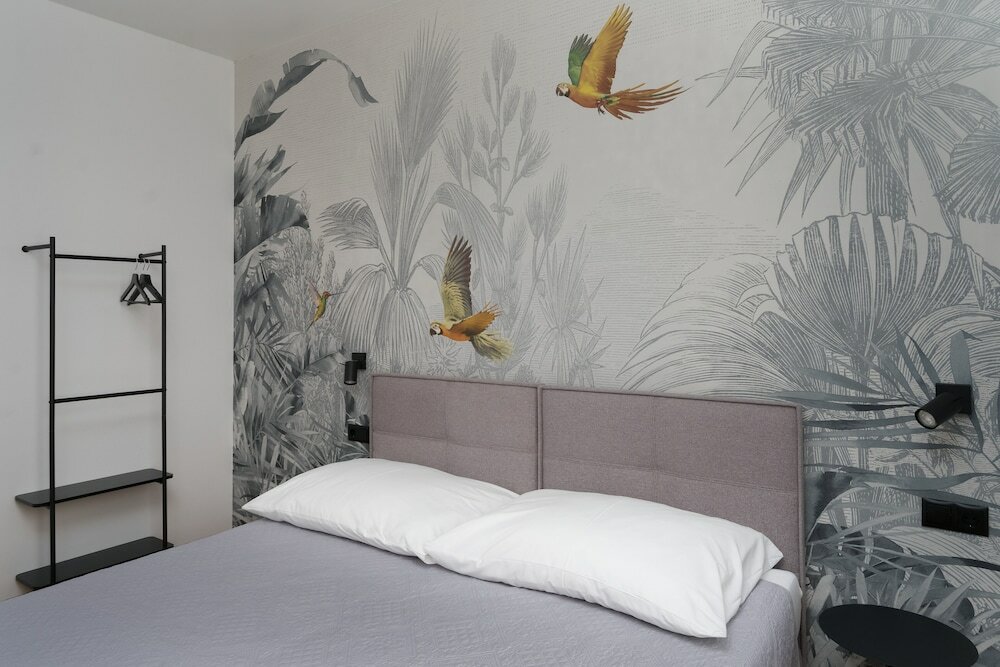 Фото Pappagallo Apartments