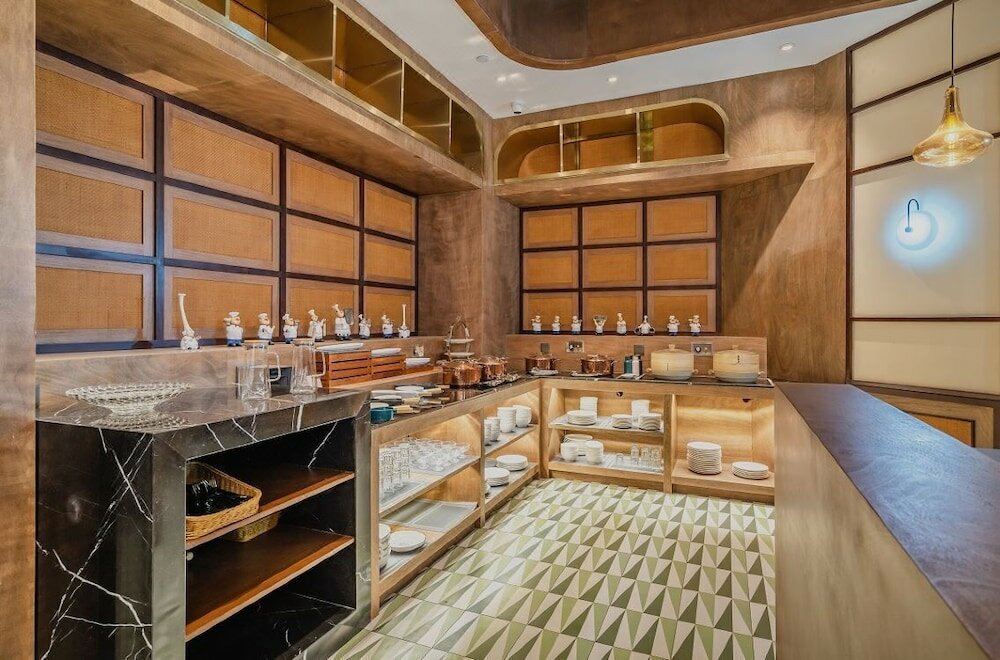 Фото Manxin Hotel Qingdao Zhanqiao