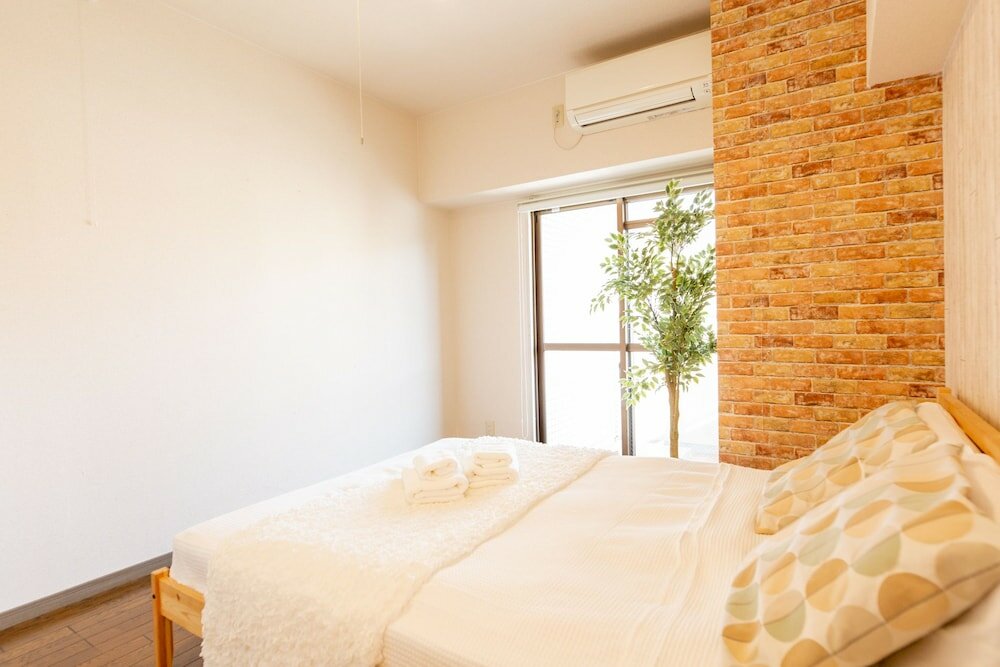 Фото Shinsaibashi Midtown Apartments