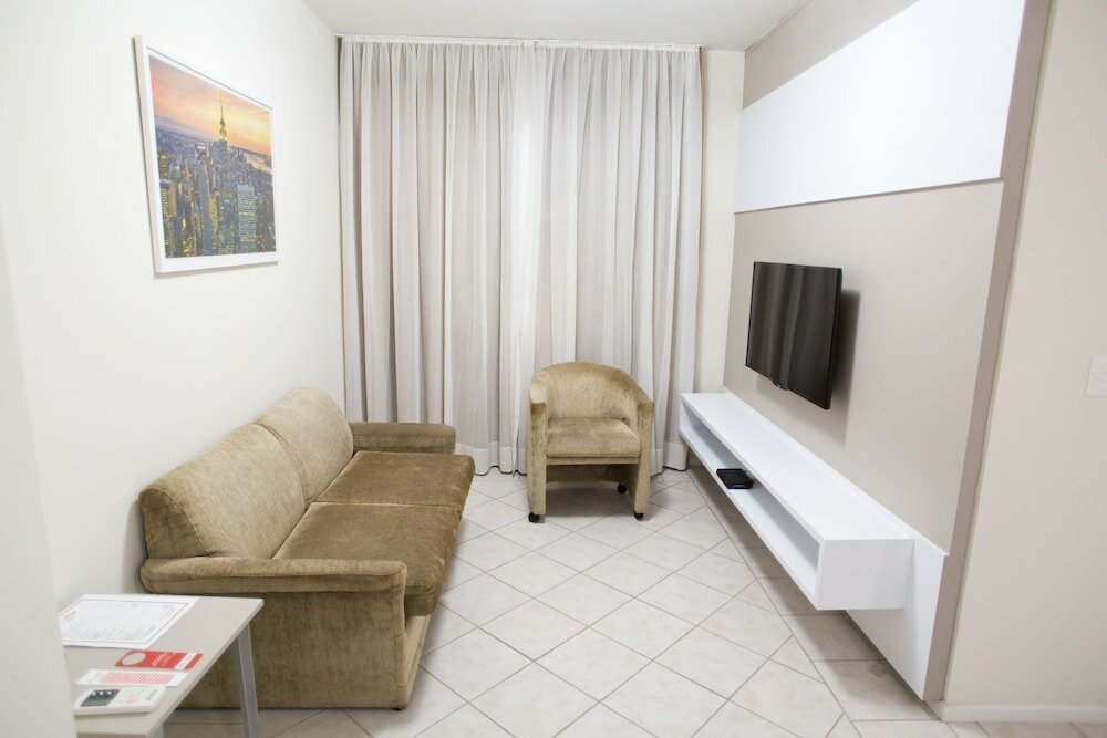 Фото Le Village Flats Hotel e Business