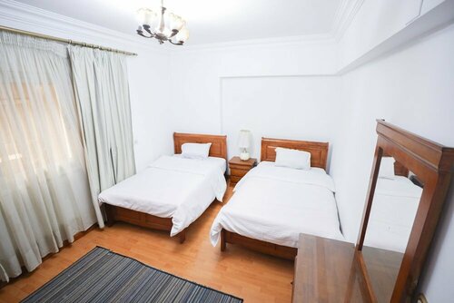 Гостиница Angel Amber Kiss 2br Apt в Каире