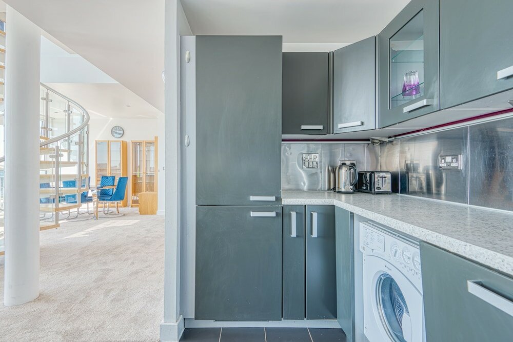 Фото Jibbs Corner Penthouse Apartment