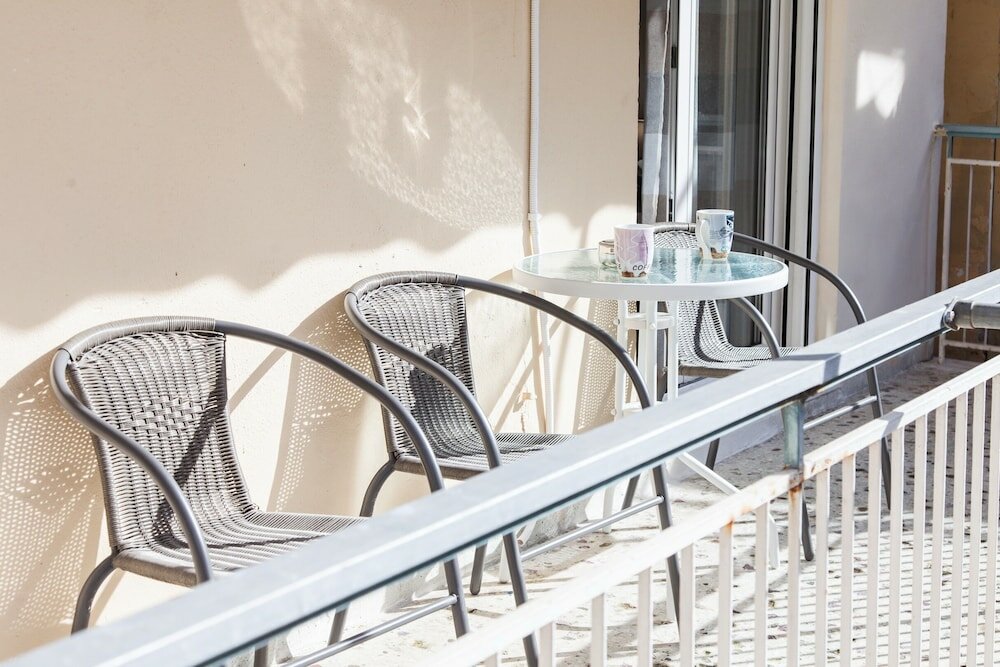 Фото Cozy apartment n Stavros Niarchos Park