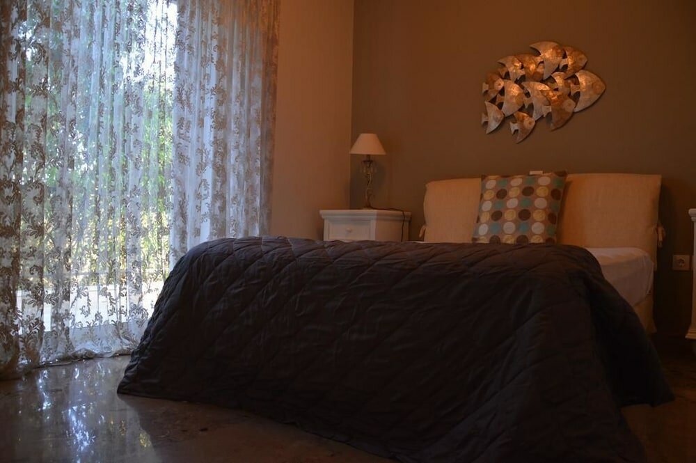 Фото Ammos Luxury Suites