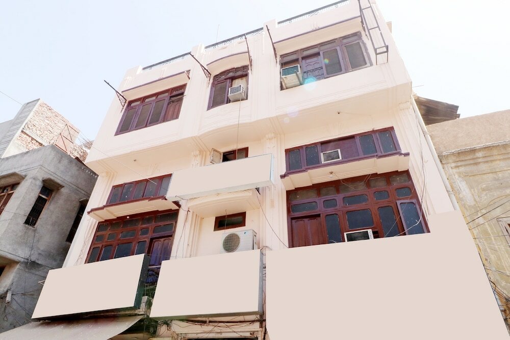 Фото Oyo 30274 Temple City Guest House