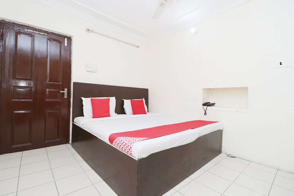 Фото Oyo 30274 Temple City Guest House