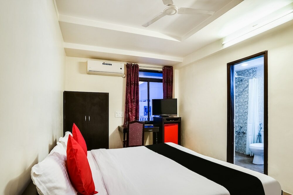 Фото Capital O 48482 Hotel Tribecca Inn