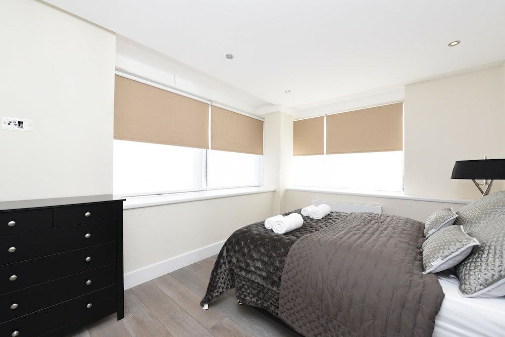 Фото The Glasshouse Apartments