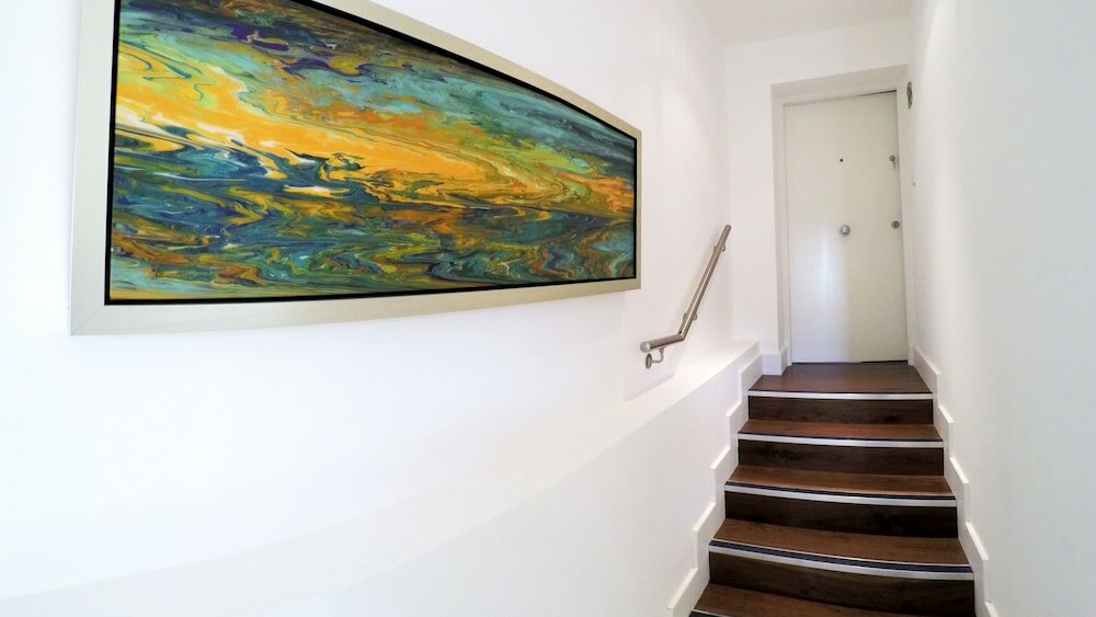 Фото The Glasshouse Apartments