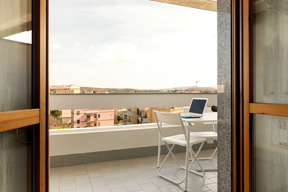 Фото Alghero Vacation Apartment