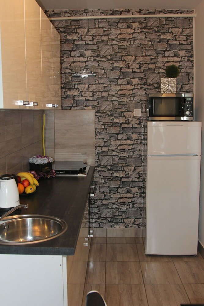 Фото Kitty Downtown Apartman