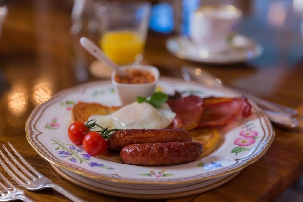 Фото Coach House Boutique B&b