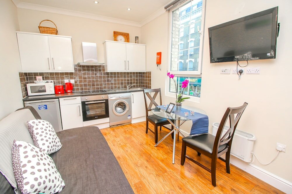 Фото City view flat at Liverpool st Brick Ln