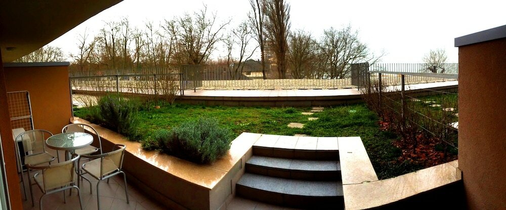 Фото Gréta Wellness Apartmanok