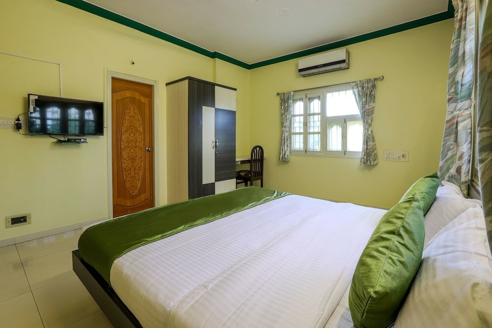 Фото Oyo 10031 Wind Chimes Boutique Guest House