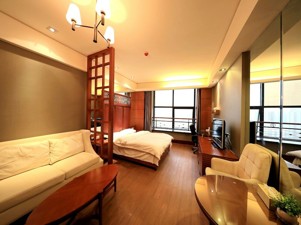 Фото Nanchang Honggutan Taili Apartment