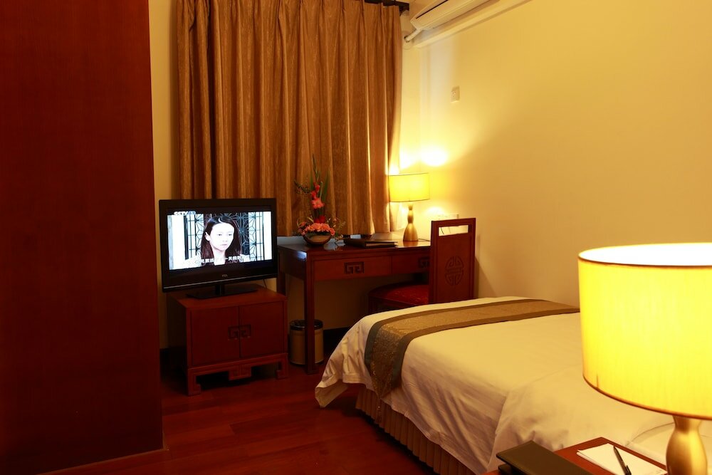 Фото Ming Wah Apartment Shenzhen