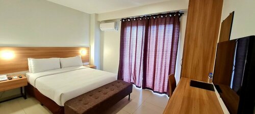 Гостиница Mango Suites - Tuguegarao в Провинции Кагаян