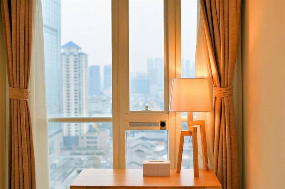 Фото Chengdu Summerisland Service Apartment