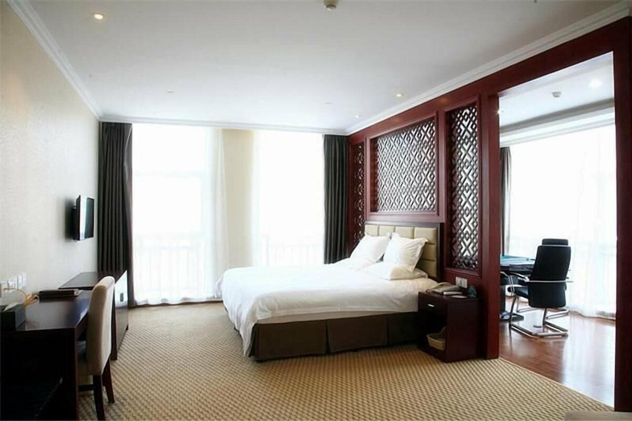 Фото GreenTree Inn Shaoxing Keqiao Xingyue Road Zhongqing Building Hotel