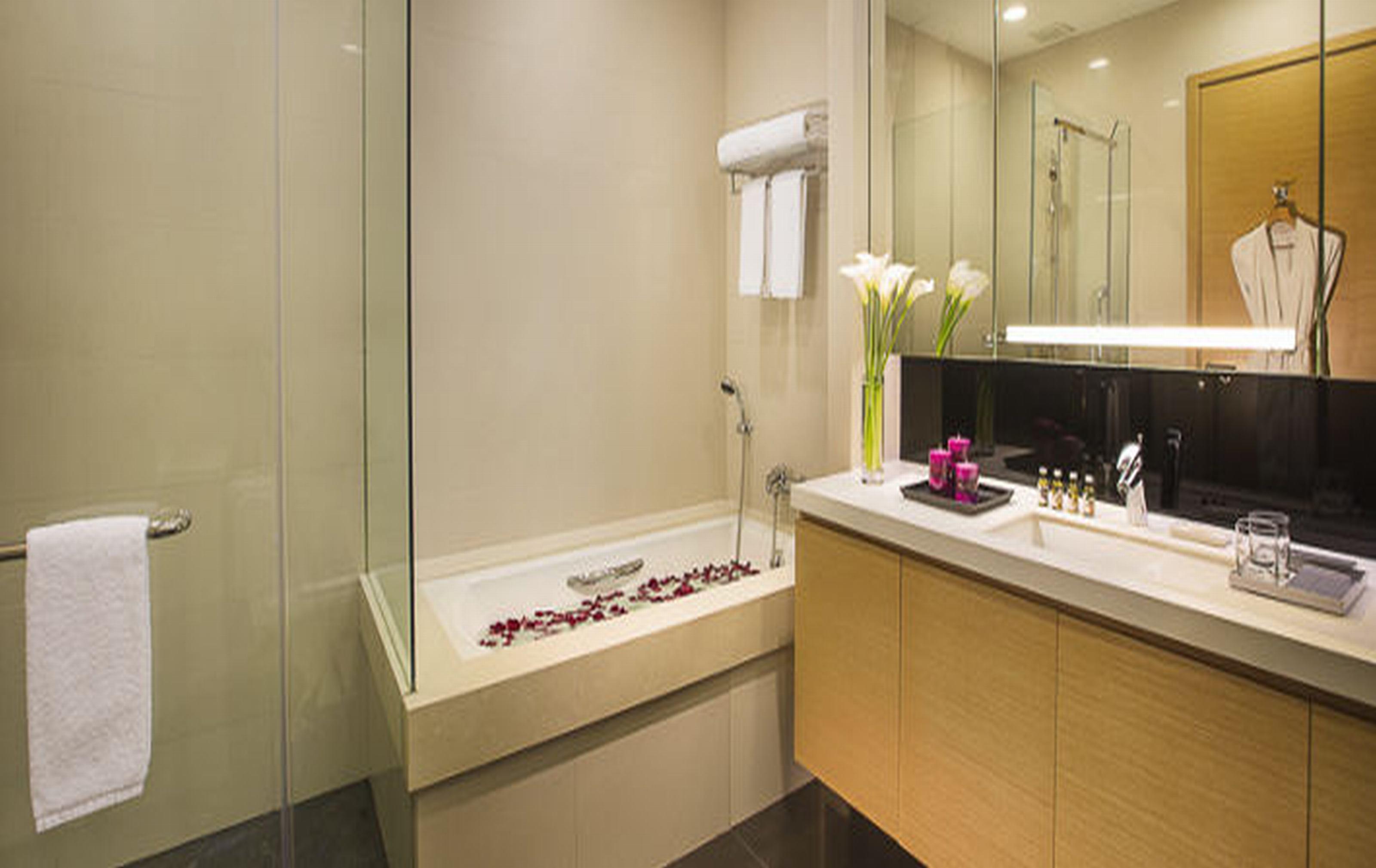 Фото Somerset Grand Central Dalian