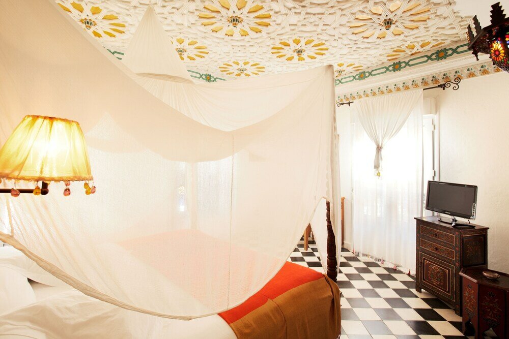 Фото Alcoba del Rey de Sevilla Boutique Hotel