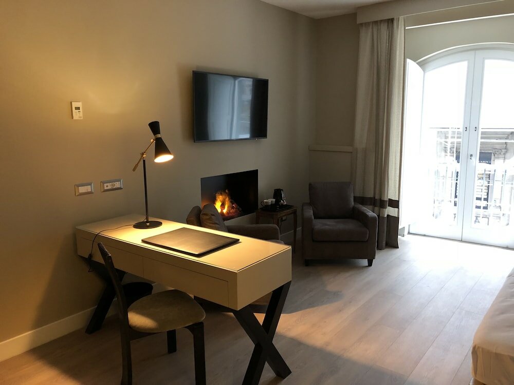 Фото Caruso Place Boutique & Wellness Suites