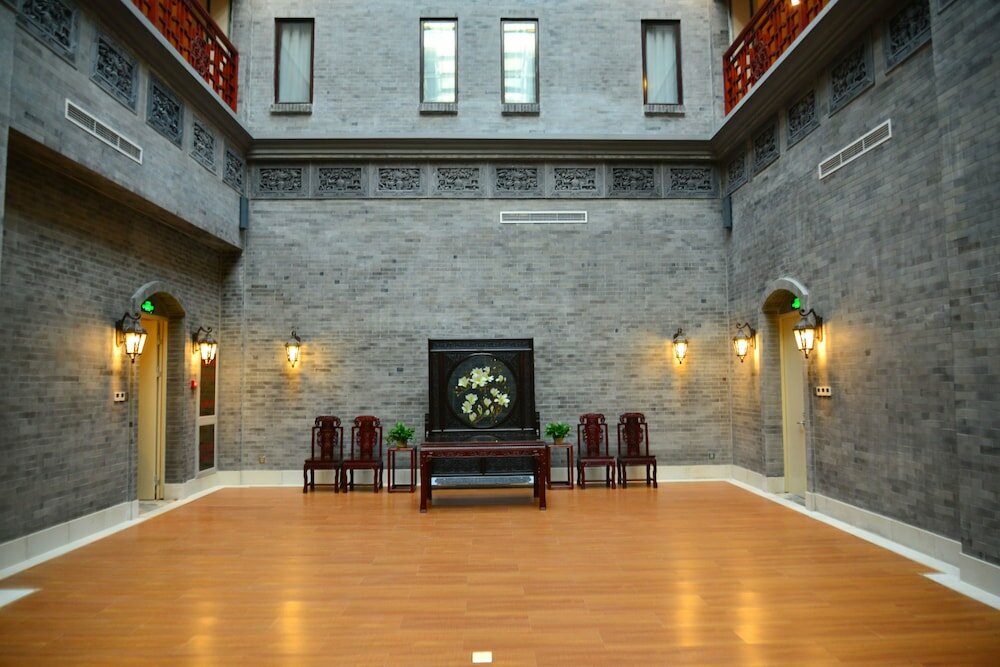 Фото Yitingzhenshe Hotel