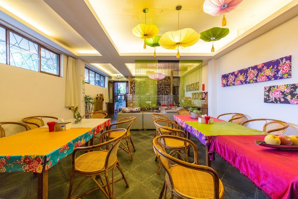 Фото Merry Inn Lijiang