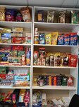 Товары (Dybenko Street, 23к1) ، محل بقالة