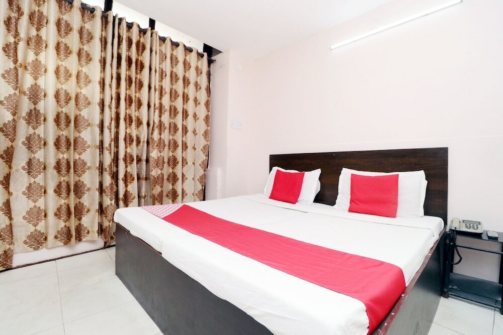 Фото Oyo 30274 Temple City Guest House