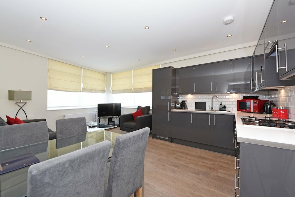 Фото The Glasshouse Apartments