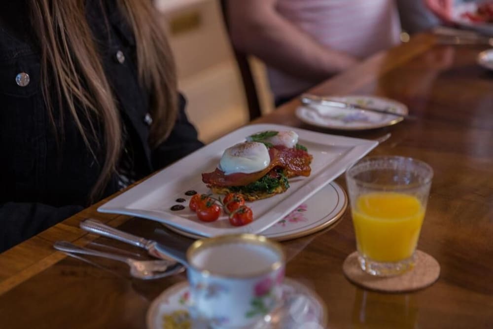 Фото Coach House Boutique B&b