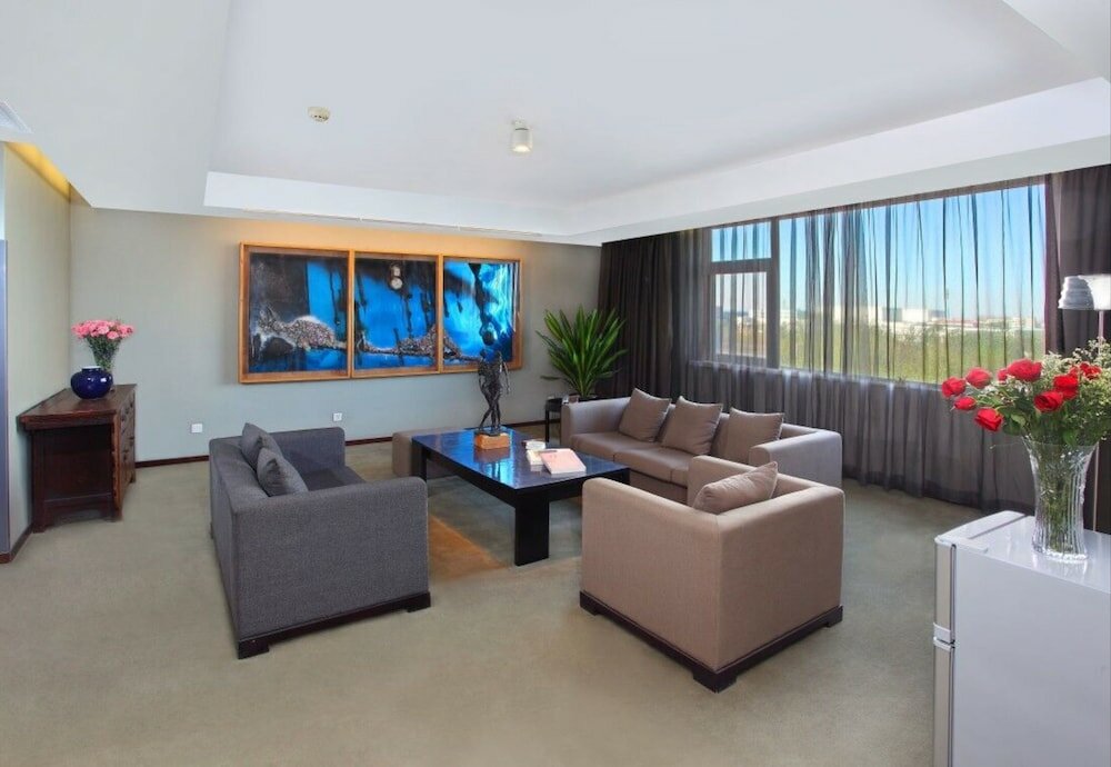 Фото Tianjin In-Zone Hotel