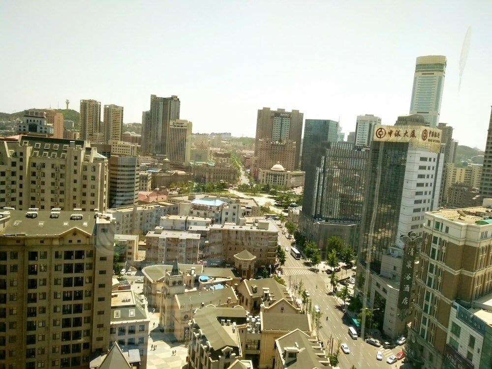 Фото Dalian Xiuzhu Building Apartment