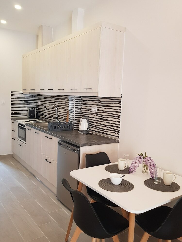 Фото Virvilis Apartments