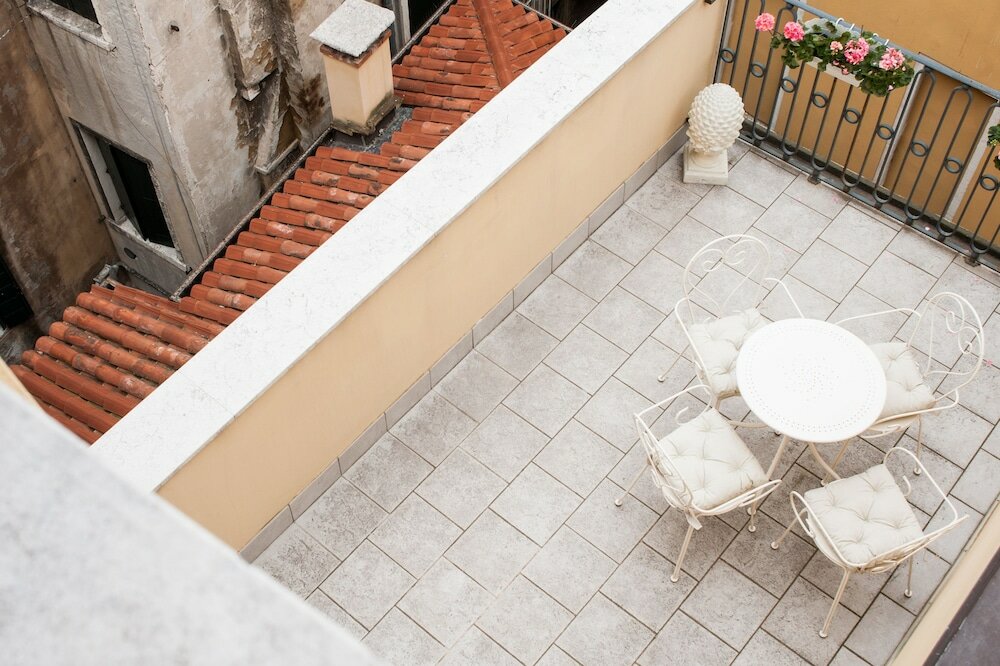 Фото San Teodoro Palace Luxury Apartments