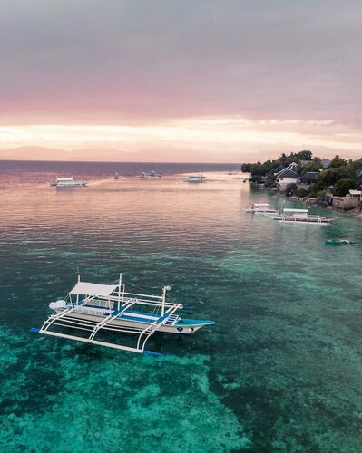 Гостиница Pescadores Suites Moalboal