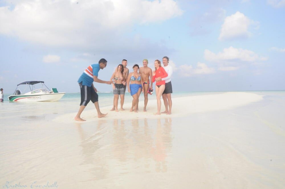 Фото Rasdhoo Coralville Hotel