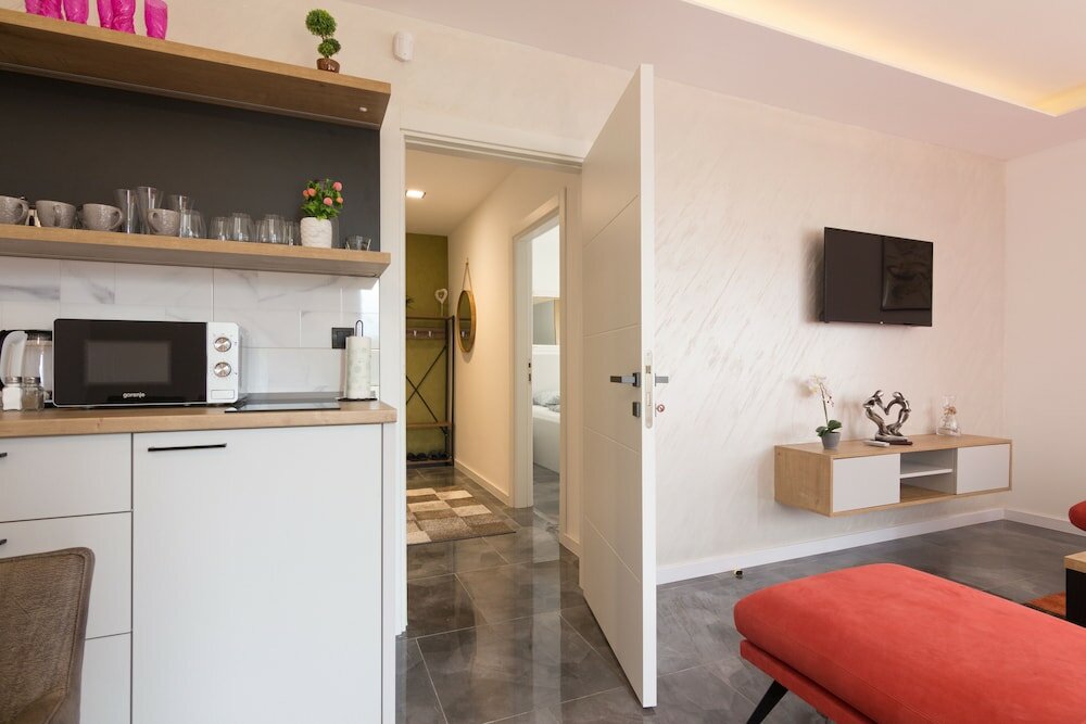 Фото Deluxe Feliciano Apartments