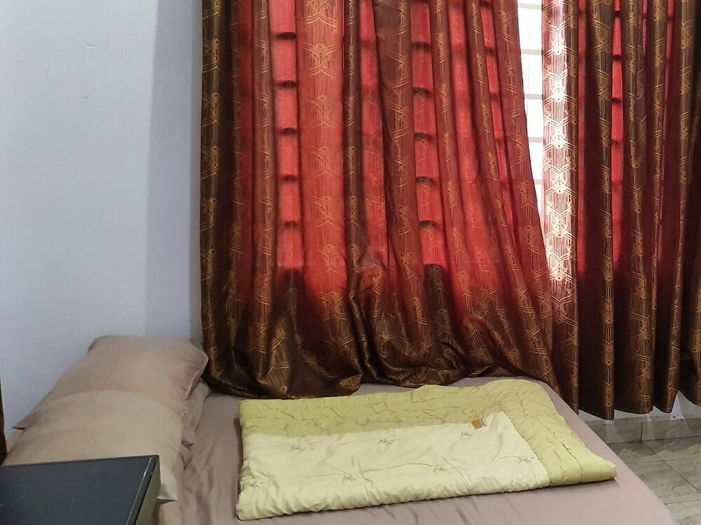 Фото Oyo Home 90496 Delima Homestay