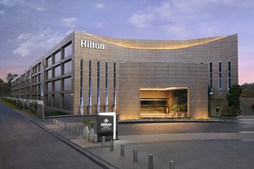 Внешний вид отеля Hilton Bangalore Embassy GolfLinks в Бангалоре, фото 1