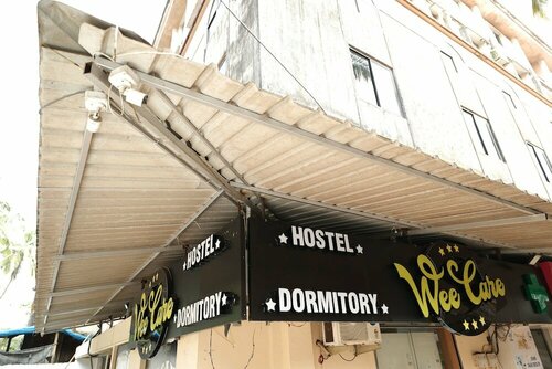 Гостиница Wee care hostel and dormitory в Мапусе