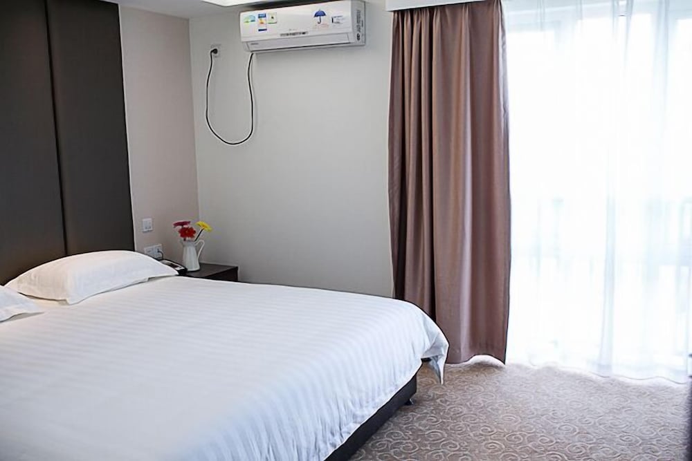 Фото Shanghai Coinfamily Hotel