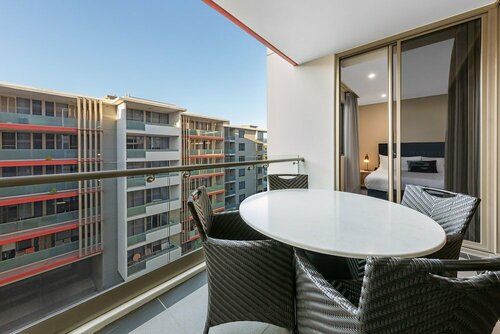 Гостиница Meriton Suites North Ryde в Сиднее