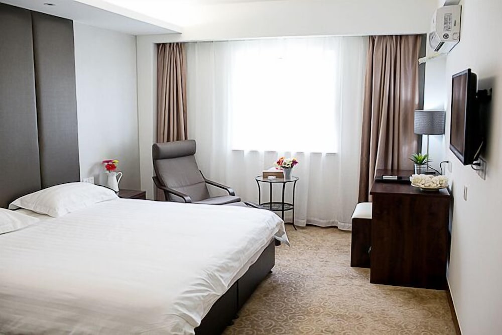 Фото Shanghai Coinfamily Hotel