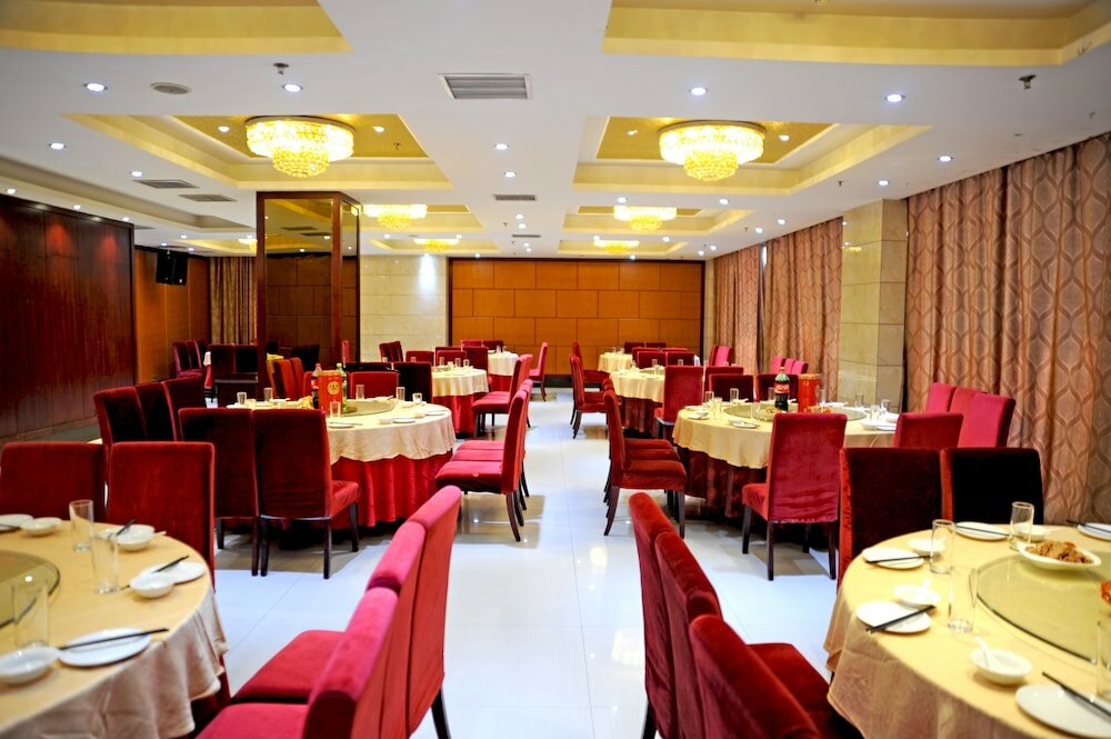 Фото Dinis Business Hotel Kaiyuan Branch