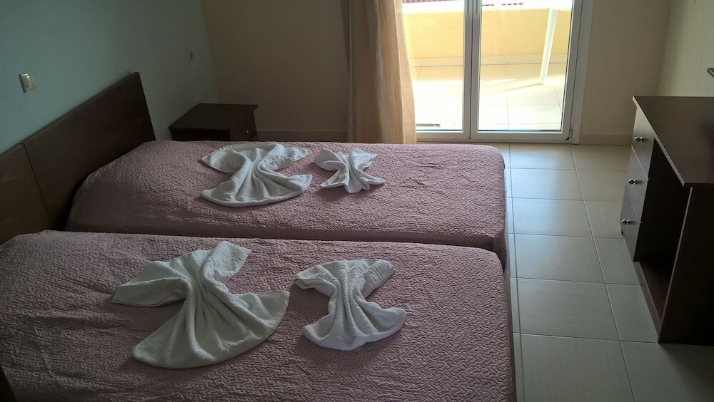 Фото Kyparissis Rooms