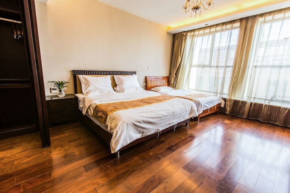 Фото World City Jiamei Service Apartment