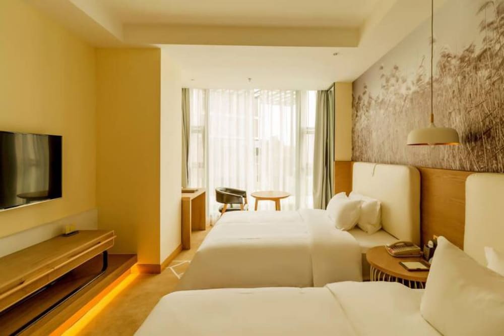 Фото Chengdu Shangcai Youran Hotel